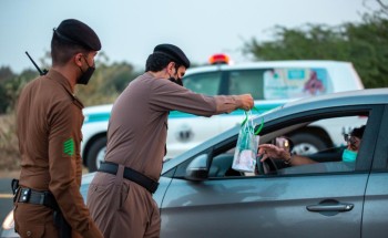 القوات الخاصة لأمن الطرق تشارك أبناء الوطن احتفالهم باليوم الوطني الواحد والتسعين