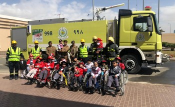 أطفال عسير المعوقين يحتفلون باليوم العالمي للدفاع المدني