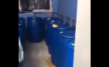 شاهد عملية ضبط وافد يدير مصنع خمور في فيلا بالرياض