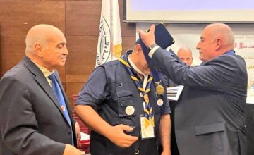 العلي يتوشح قلادة الإتحاد العربي