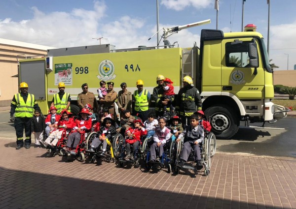 أطفال عسير المعوقين يحتفلون باليوم العالمي للدفاع المدني