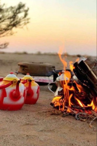 استشاري يحذر من خطورة إشعال النار والجلوس بالقرب منها للتدفئة على صحة العين