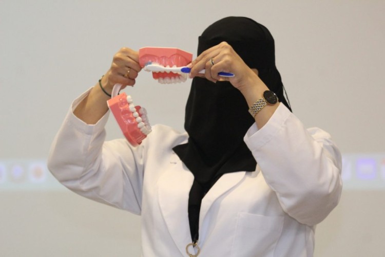 صحتي في نظافة أسناني محاضرة طبية بمركز التأهيل الشامل بجازان
