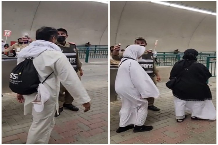 “لن تجدها في أماكن آخرى من العالم” .. شاهد: رجل أمن يخفف على الحجاج من حرارة الشمس برش رذاذ الماء البارد على رؤوس الحجاج