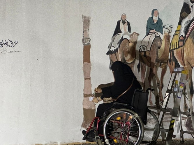 بالفيديو : ذوي الإعاقة يرسمون الأمل على جدارية منتزه الخزامى بالجوف ضمن مبادرة مجتمعية فنية