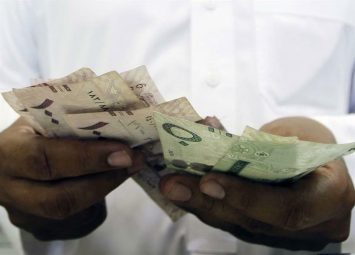 “وزارة المالية” تنفي فرض رسوم على التحويلات النقدية للعاملين الأجانب