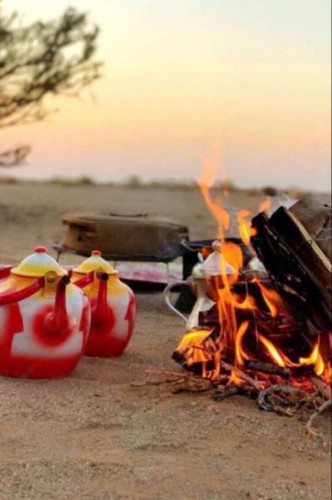 استشاري يحذر من خطورة إشعال النار والجلوس بالقرب منها للتدفئة على صحة العين