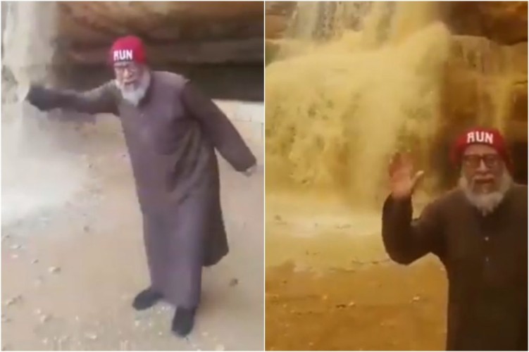 شاهد : رجل مسن يعبر عن فرحته بشلالات الأمطار في حريملاء