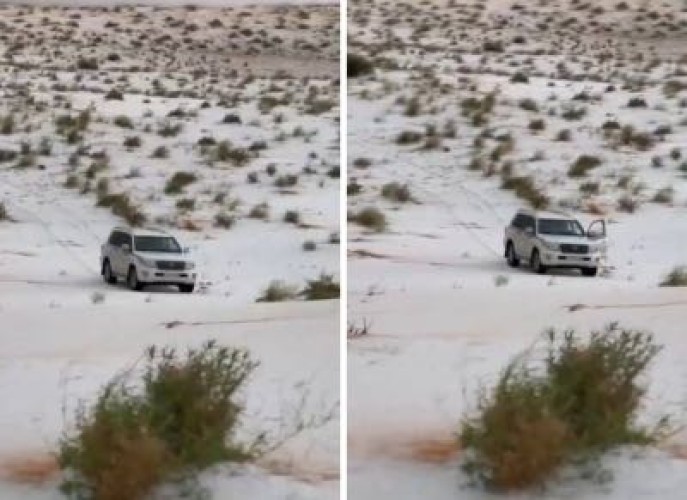 عقب هطول الأمطار المصحوبة بالبرد .. بالفيديو: صحراء النفود الكبير بـ”حائل” تتحول من اللون الأصفر إلى البياض الناصع
